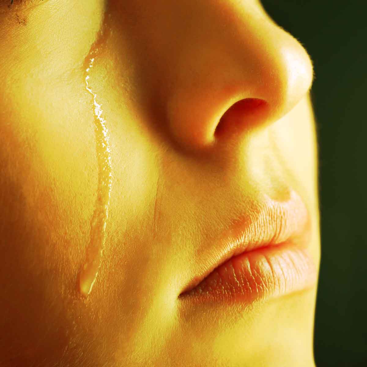 person crying from grief and sadness
